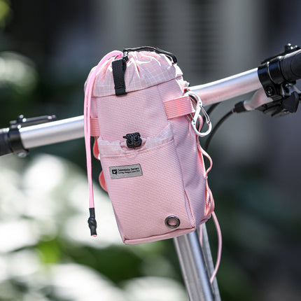 Cloud Cream bike bottle bag in a cycling lifestyle scene