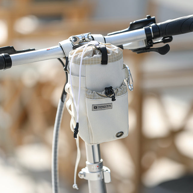 Pearl White bike bottle bag mounted on a bicycle