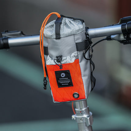 Gray and Orange BCT0214 bike bottle bag mounted on a bicycle