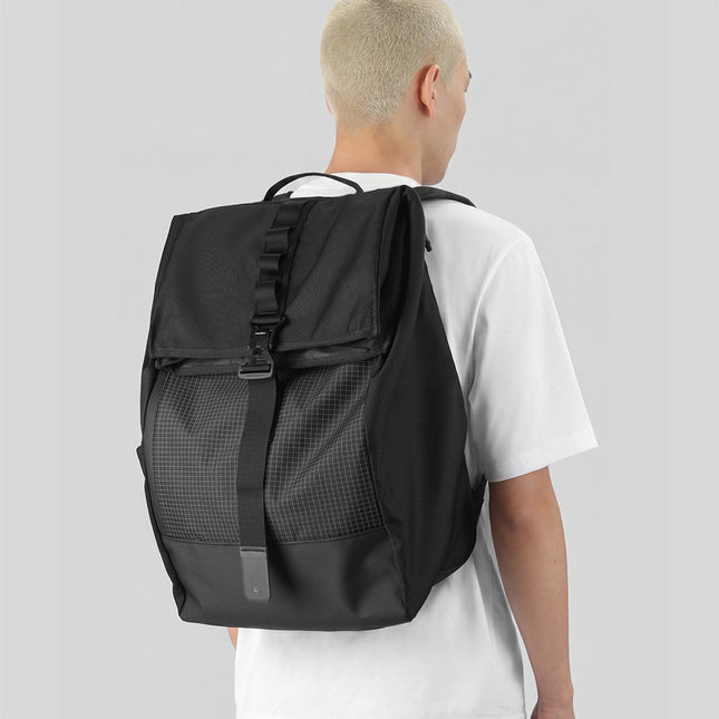 Rhinowalk MBB3001 motorcycle backpack worn by a rider